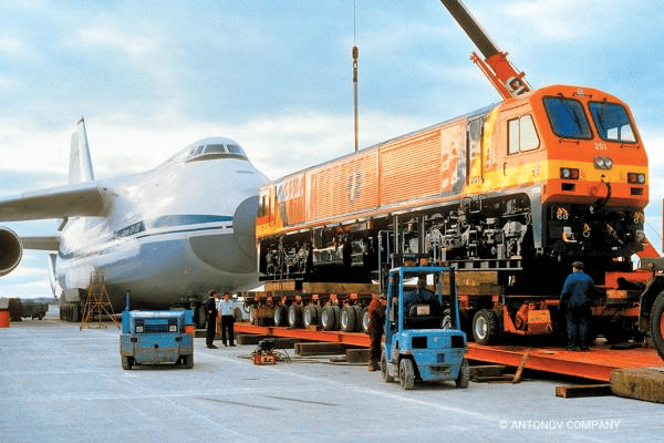 Train being loaded onto a plane